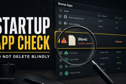 Magnifying glass inspecting a suspicious Windows startup app entry before removal.
