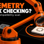 An orange inspection arm repeatedly checks a computer chip.