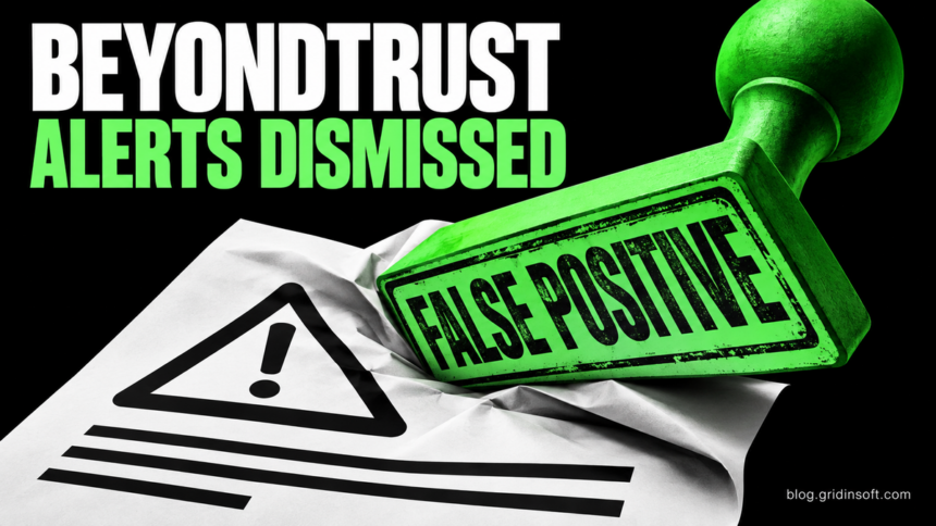 A giant green false-positive stamp presses down on an alert document.
