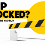 A yellow checkpoint barrier stops an application file